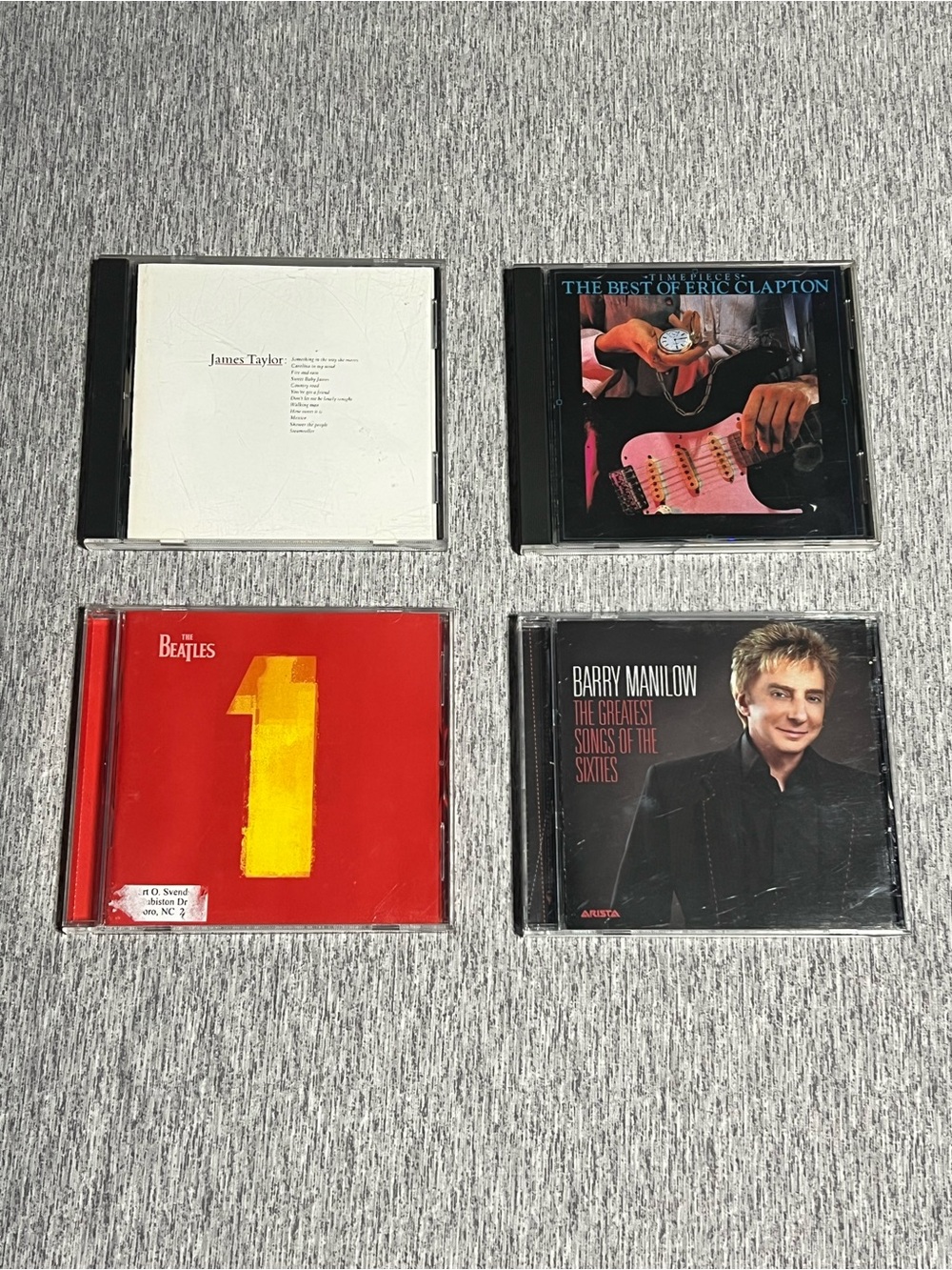 Lot of 4 Hits Music CDs - The Beatles, Barry Manilow, Eric Clapton, James Taylor